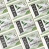 Numi Gunpowder Green tea bags on a plain background